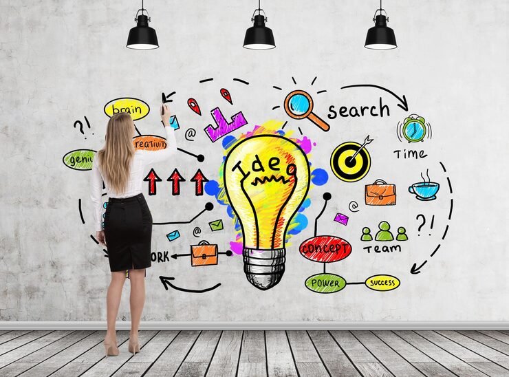 rear-view-blond-businesswoman-wering-black-skirt-drawing-bright-idea-sketch-concrete-wall_780608-19915